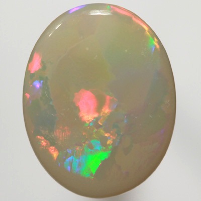 SOLID SEMI BLACK OPAL  Very bright fire in a Flag Harlequin pattern. SEE VIDEO